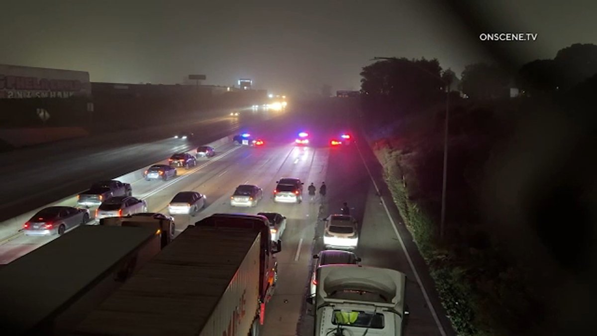 A possible shooting shut down southbound lanes of the 405 Freeway in Long Beach. One person was taken to a hospital in unknown condition