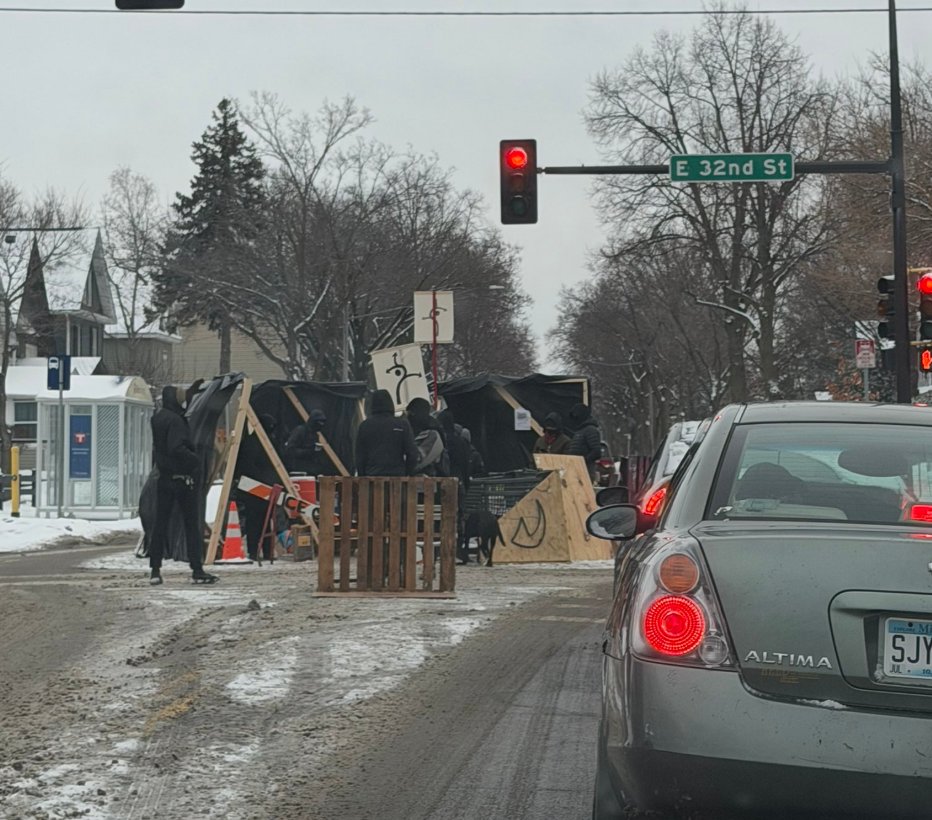Protesters have set up roadblocks and are checking people's ID who try to pass through the area from 32nd to 34th and Cedar Ave.