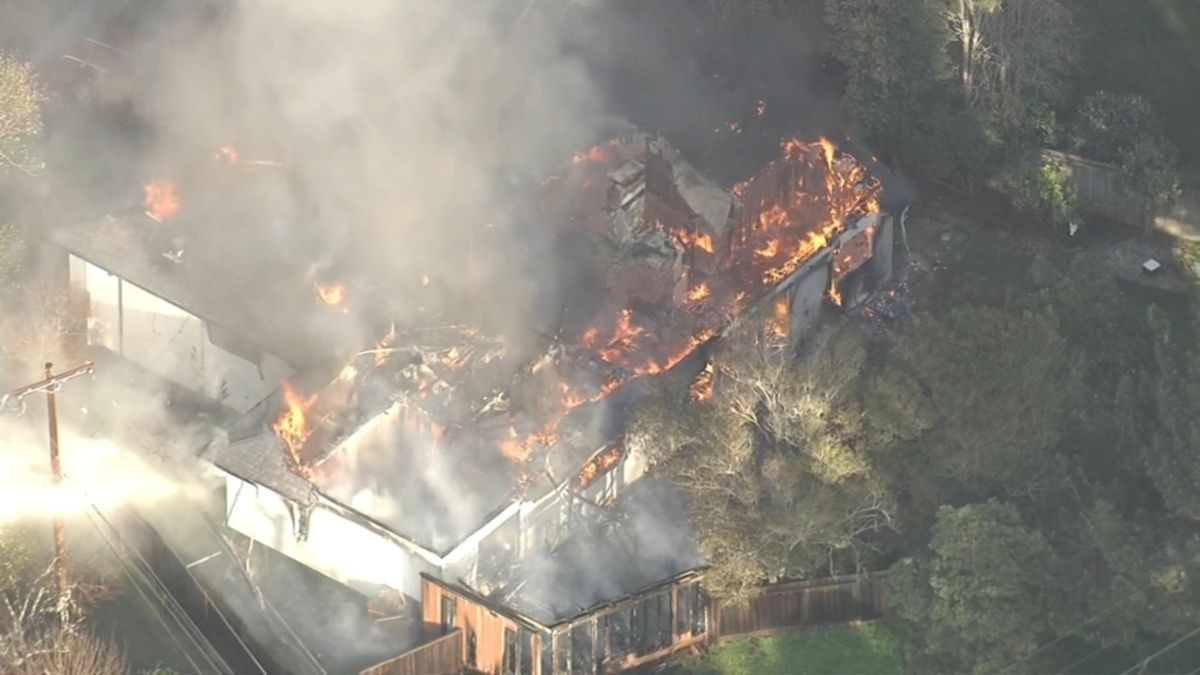 Police investigating homicide after shooting, large fire at San Bruno home