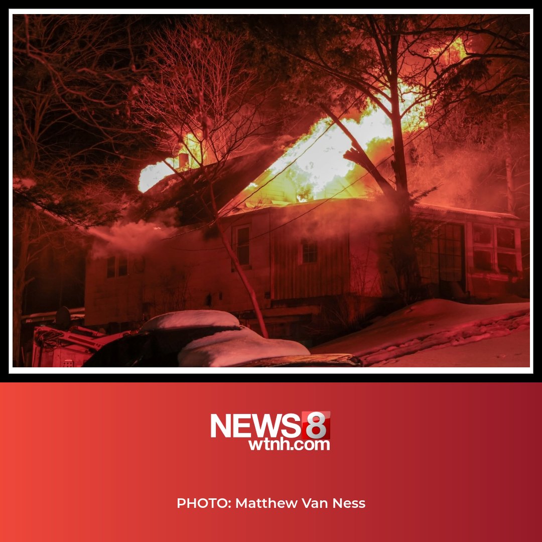 A dog was rescued and a firefighter was briefly hospitalized after a house fire on Grieb Road in Wallingford on Wednesday night, fire officials said