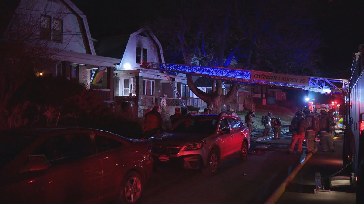 A person was hospitalized and a firefighter was injured after a house fire broke out in Cincinnati