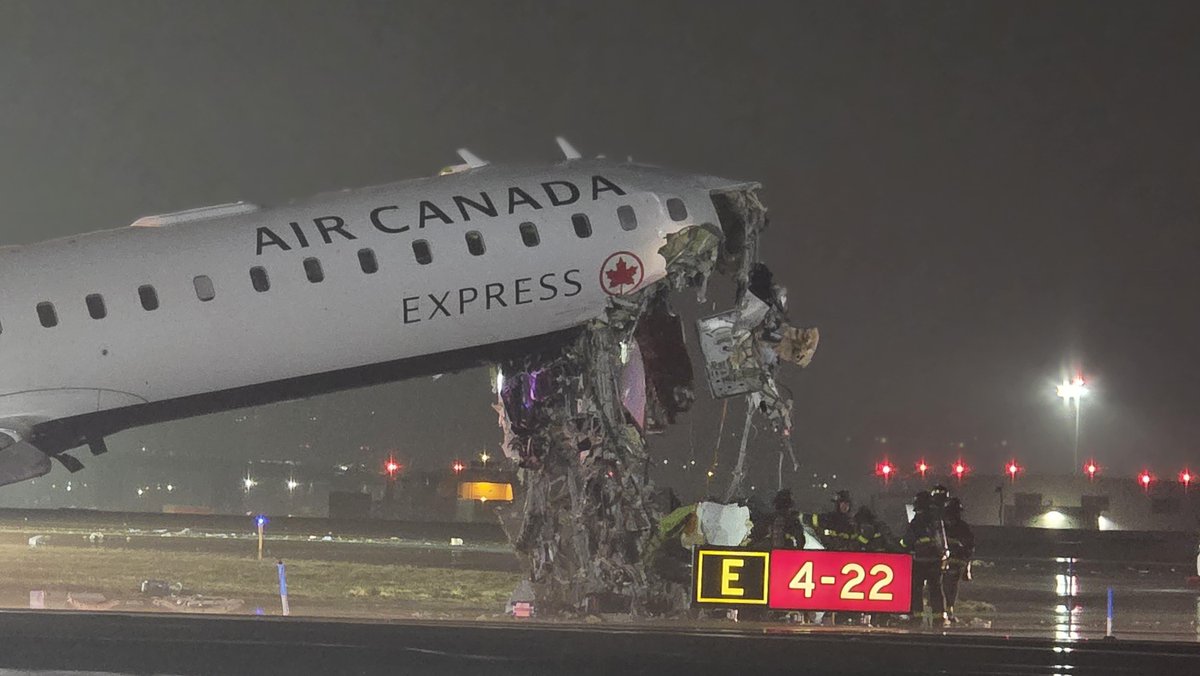 Pilot and copilot killed in plane collision at New York airport  Air Canada plane badly damaged after collision with fire truck at New York's LaGuardia Airport