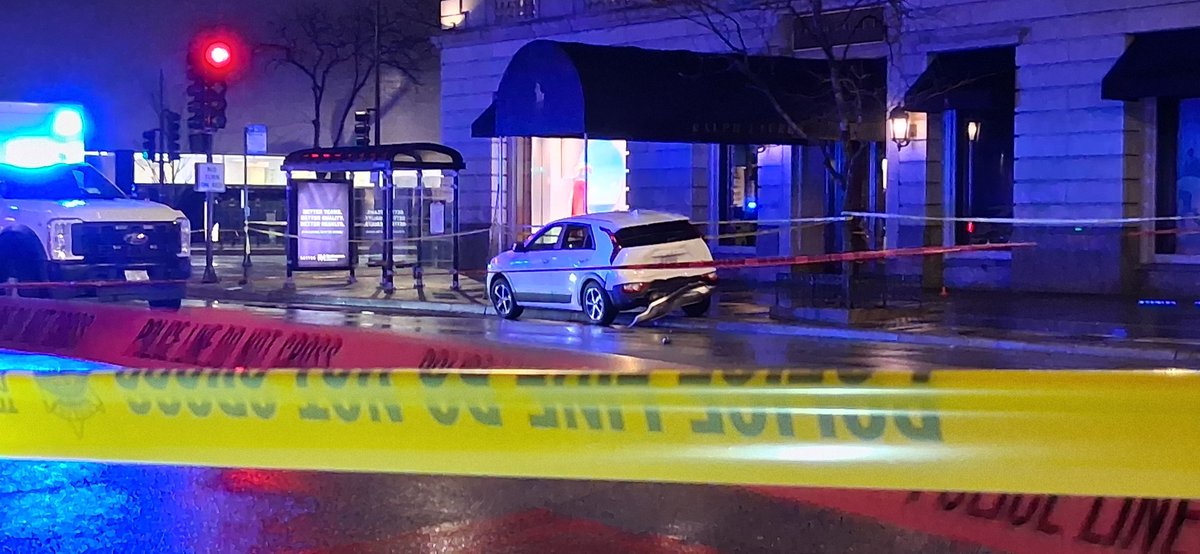 Pedestrian shot during shooting between cars 0-100 block of E. Chicago. Officers responded to a call for service. A 22-year-old male was driving a red sedan when he was approached by a white sedan occupied by an Rush Street somebody shooting out the back window of a car