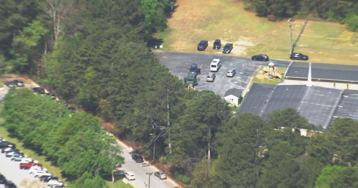 School lockdown lifted after officers execute search warrant in neighborhood