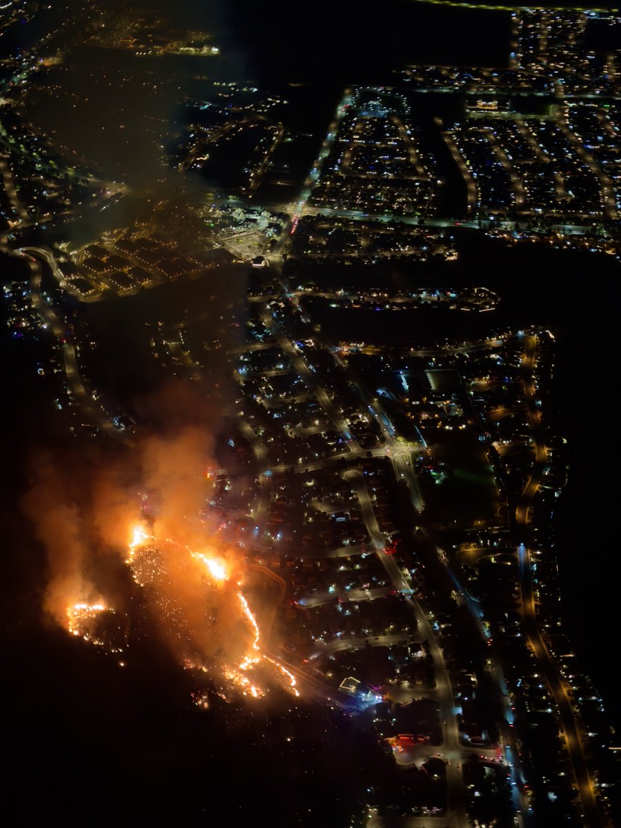 The Springs Fire is raging into the night as it encroaches towards the Ridgecrest neighborhood in Riverside County, CA.