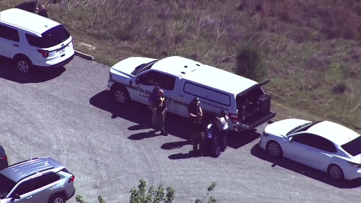 A man who was allegedly attempting to stop a dog from attacking a woman shot and killed the dog's owner instead of the animal