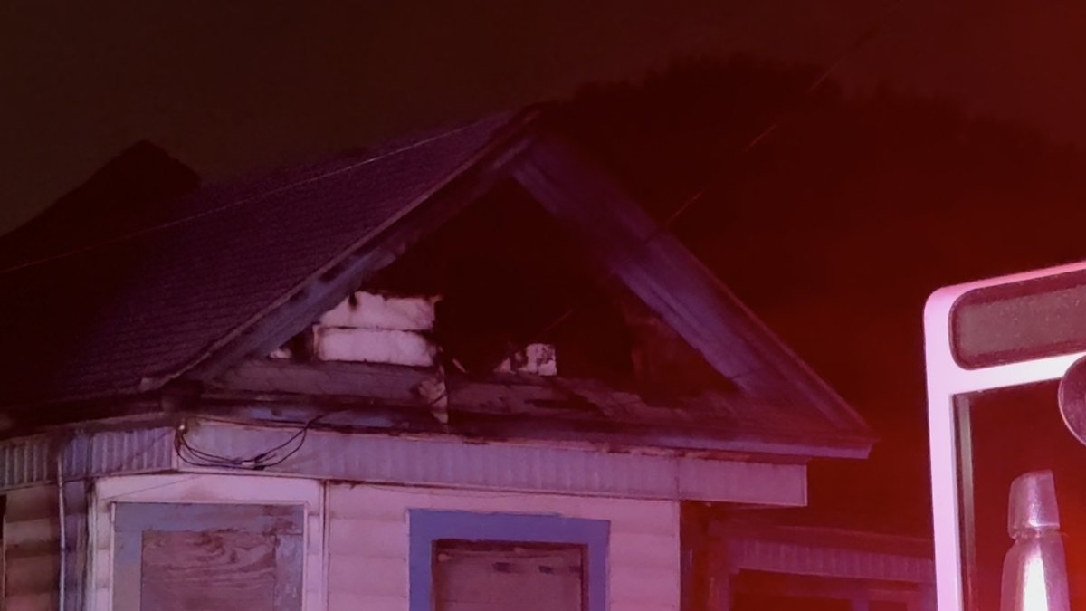 A portion of a roof collapsed while crews were battling a duplex fire on the South Side