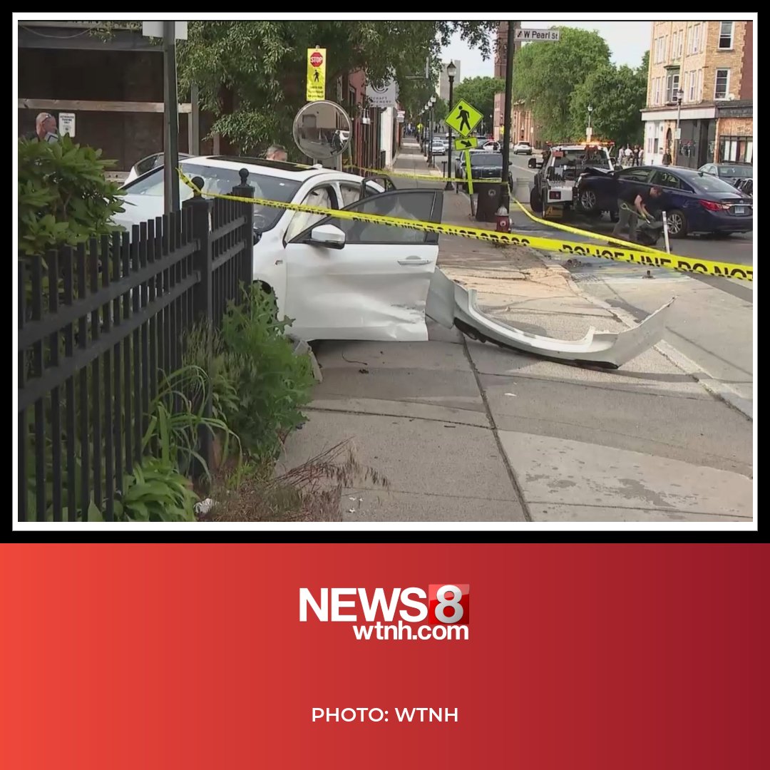 New Britain police are investigating a shooting between two cars, which left at least one man hospitalized after a car crashed into the side of New Britain EMS headquarters on Tuesday
