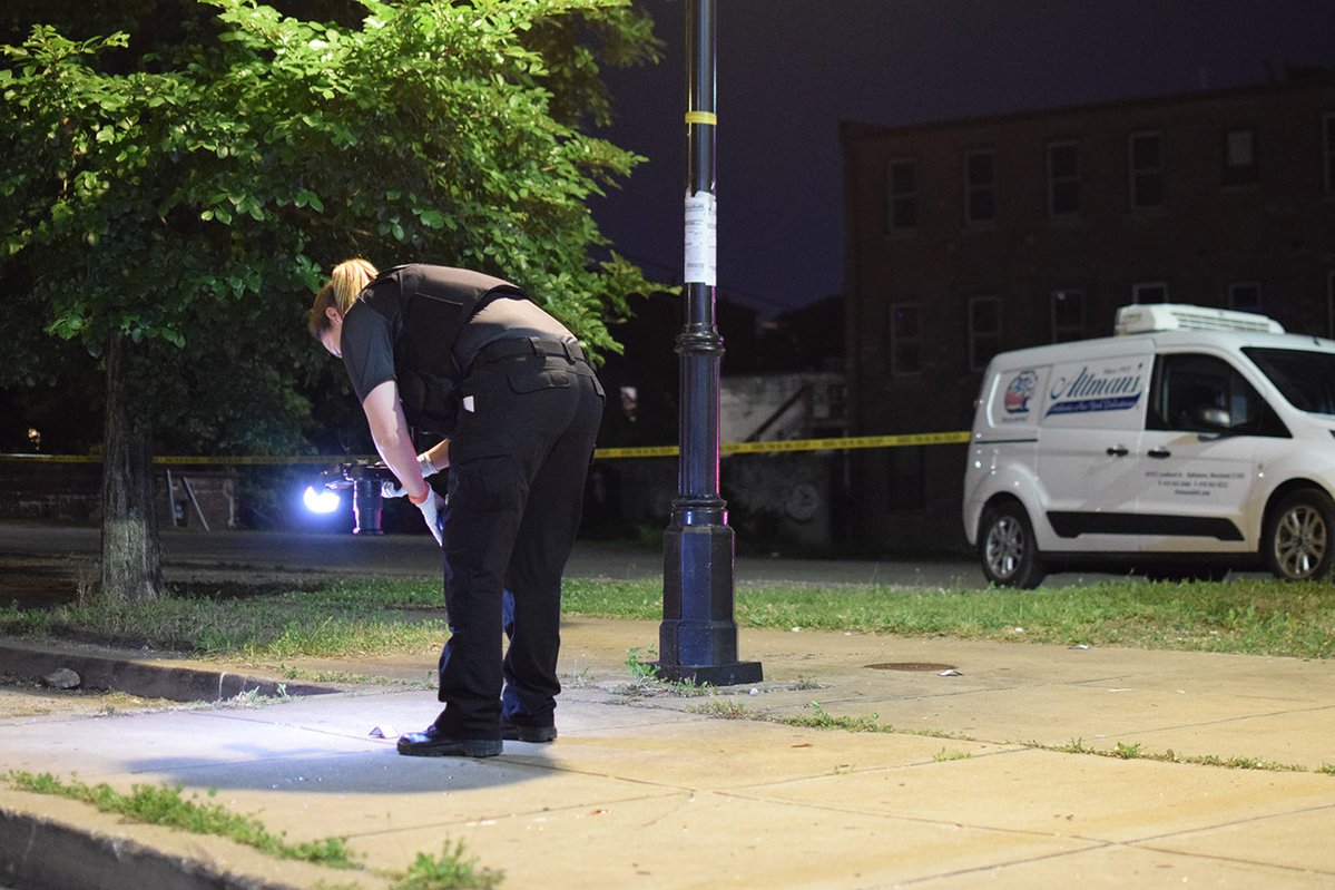 The same crime lab technician then drove to the 1100 block of East Lombard Street and collected evidence of gunfire from both sides of the street. There was a crime scene along the 1100 block and a crime scene next to the 1000 block