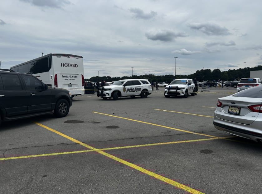 1 dead, 4 stabbed in charter bus in Walmart parking lot
