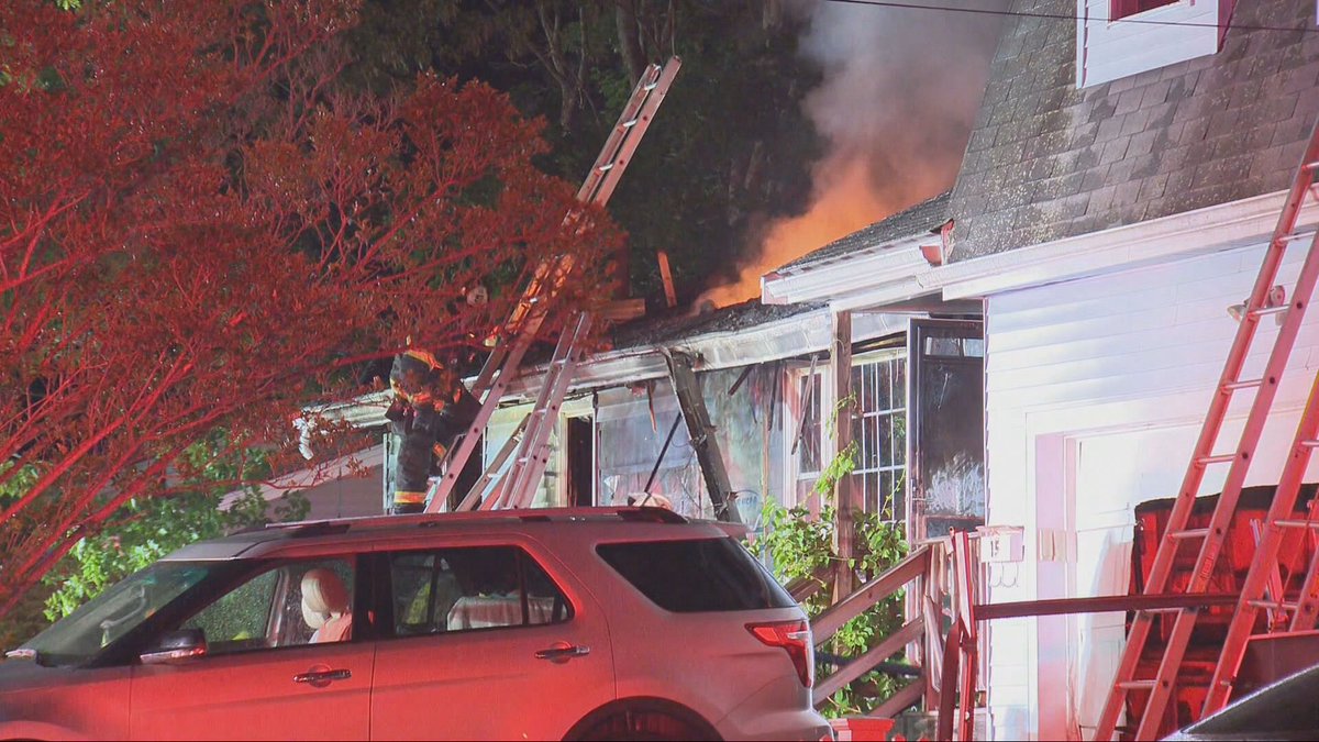 Neighbors remember two sisters who died in a house fire in Bellingham, right over the R.I. line