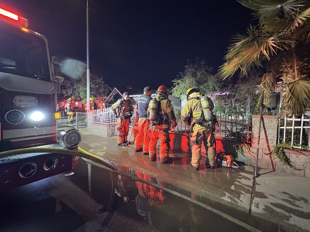 Firefighters have extinguished a 1st Alarm double house fire near 51st Ave and Thomas. A total of 8 people are displaced, and personnel from the Community Assistance Program are assisting with their needs. No injuries were reported.
