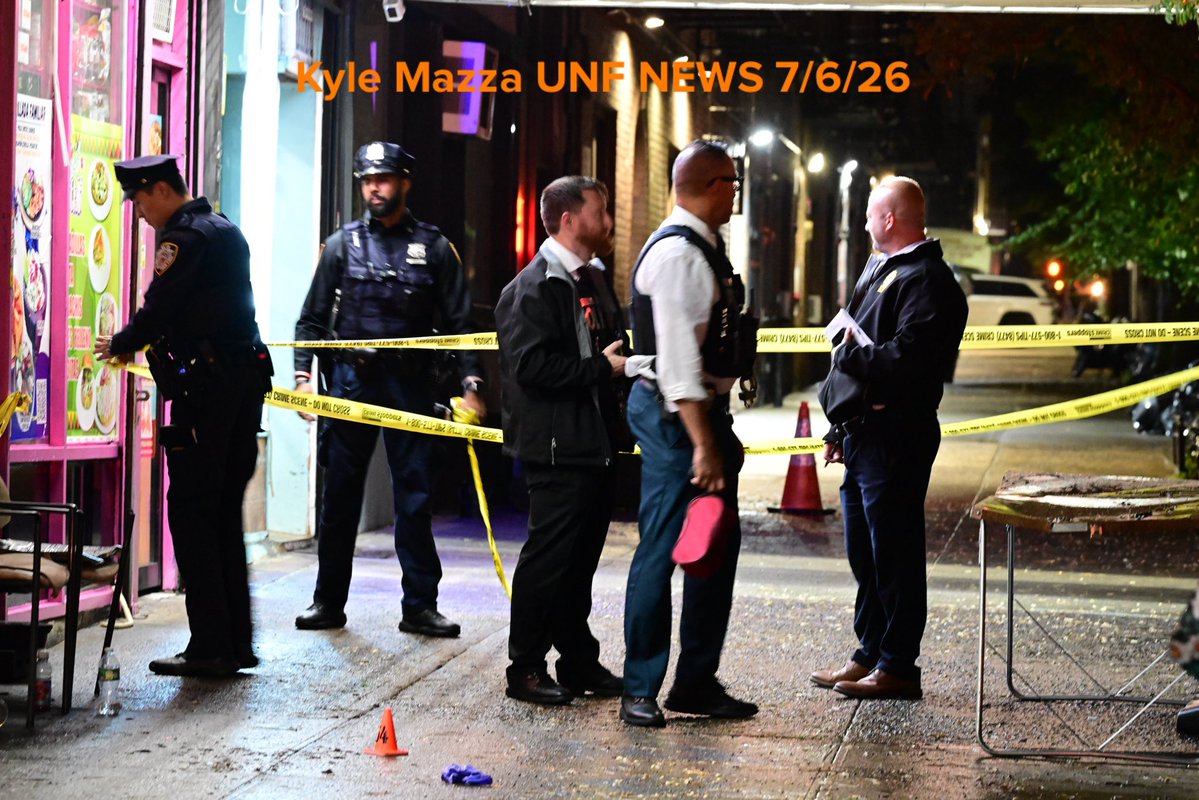 NYPD officers work the scene where a man was shot to the head in the area of White Plains Road and Archer Street in Bronx, New York, United States. The man who was shot to the head was rushed to a local area hospital and originally listed in critical condition. There are no arrests and the investigation is ongoing by the NYPD. A large pool of blood was found at the scene along with a shell casing.