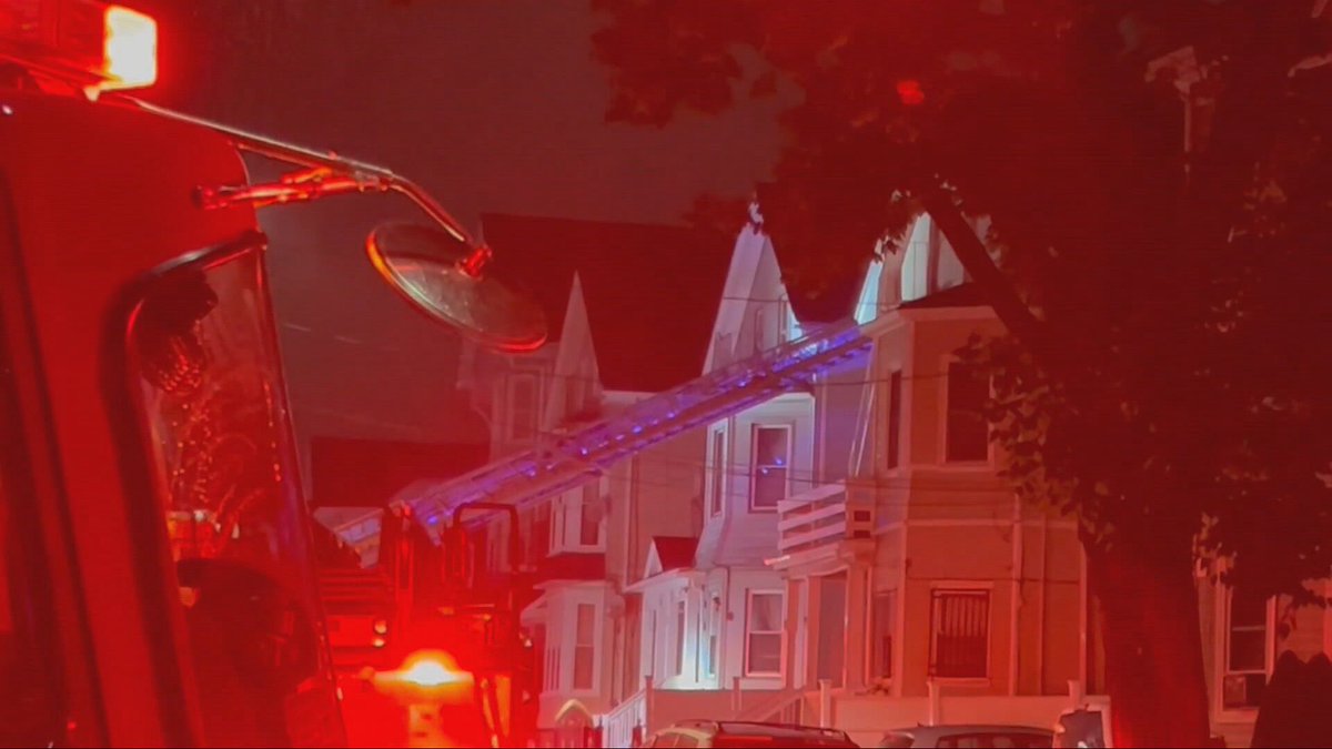 A woman rescued from a home on fire in Providence