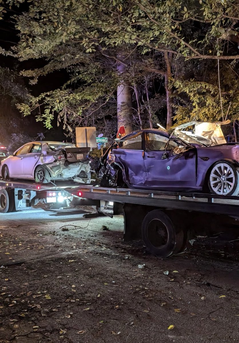 Neighbors tell they have no power after a Tesla came crashing down Northside Dr into their front lawns. They say the driver took off running & a second vehicle was also hit - that driver taken away in a stretcher