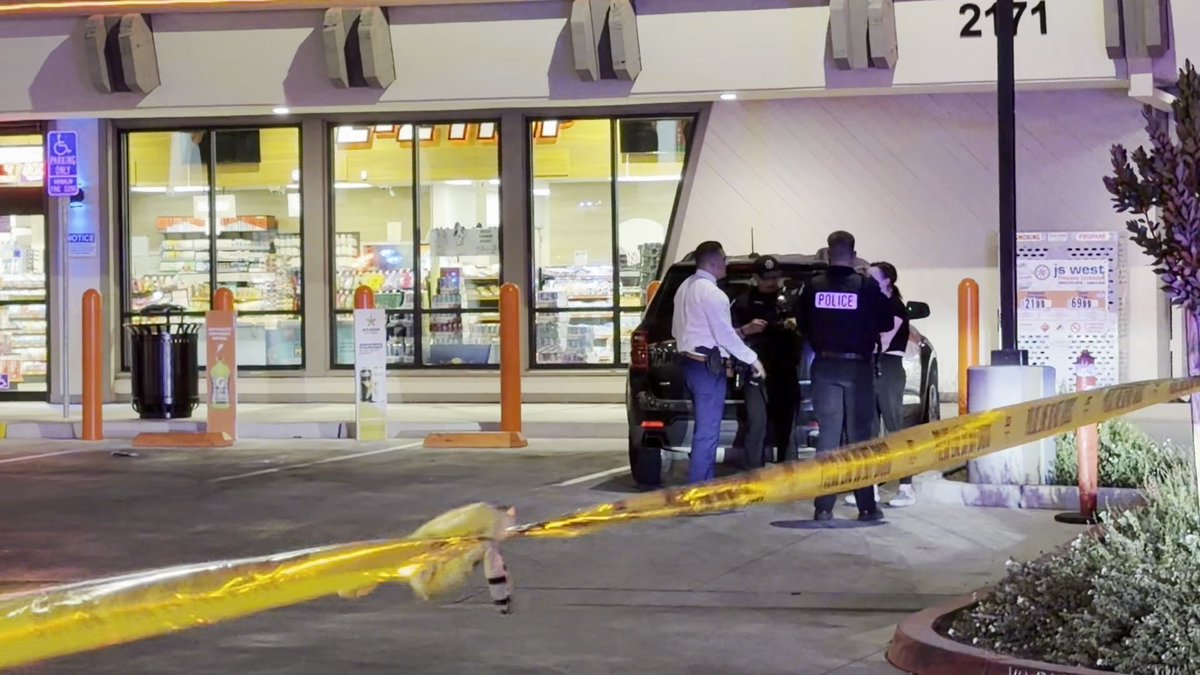One man was hospitalized, and another was arrested after a stabbing at an EZ Trip gas station in Fresno on Tuesday