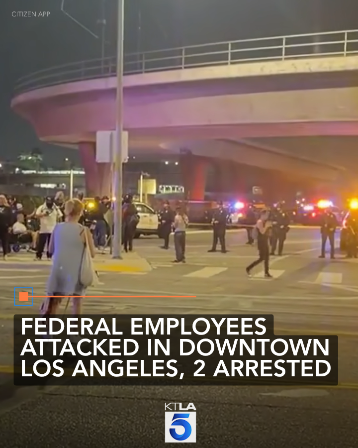 Two people were arrested after federal employees were attacked in downtown Los Angeles late Saturday night, police said