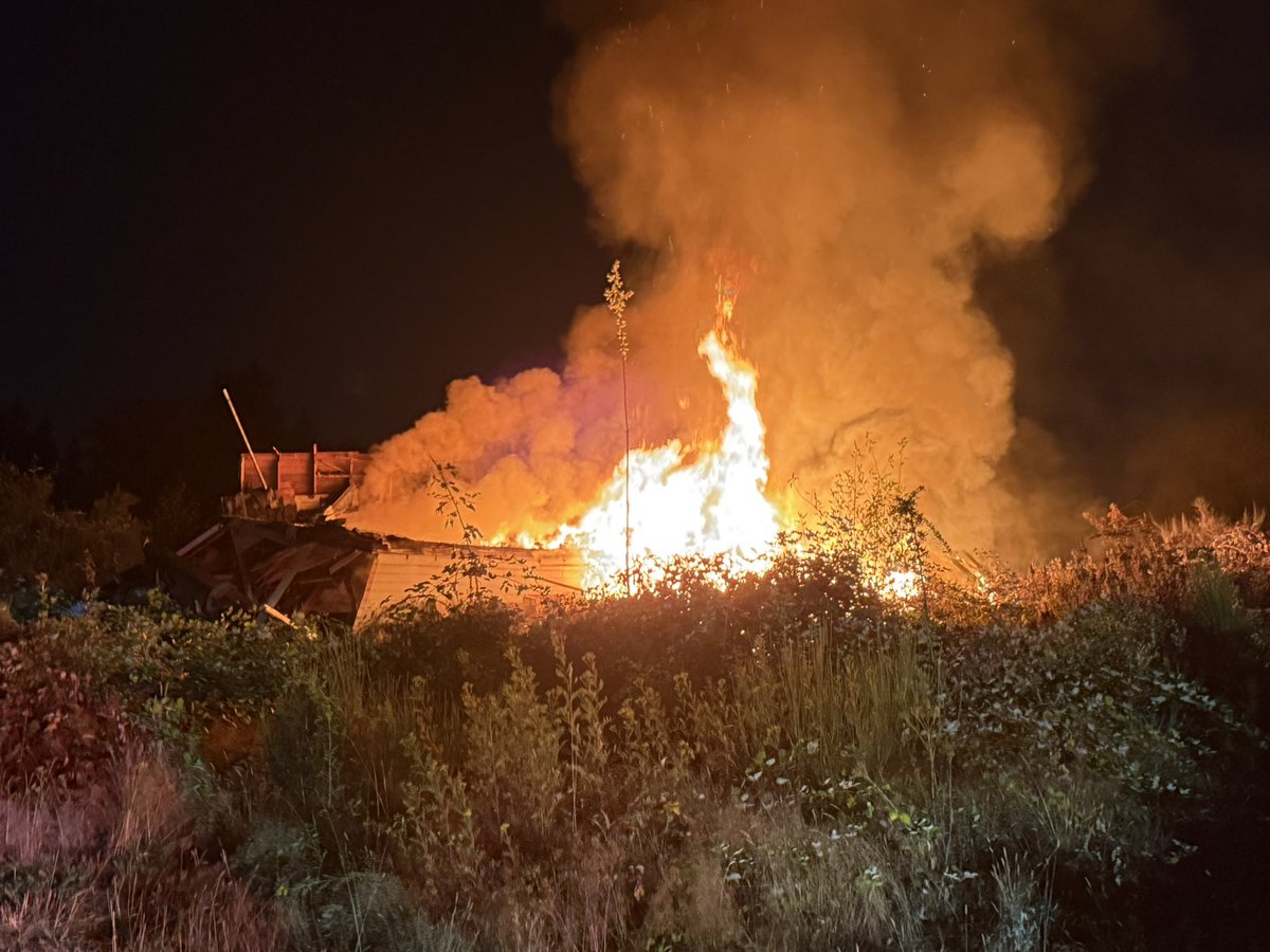 Puget Sound Fire is on scene of a vacant house fire in the 23200 block of 132nd Avenue SE. the house was fully engulfed in flames when firefighters arrived