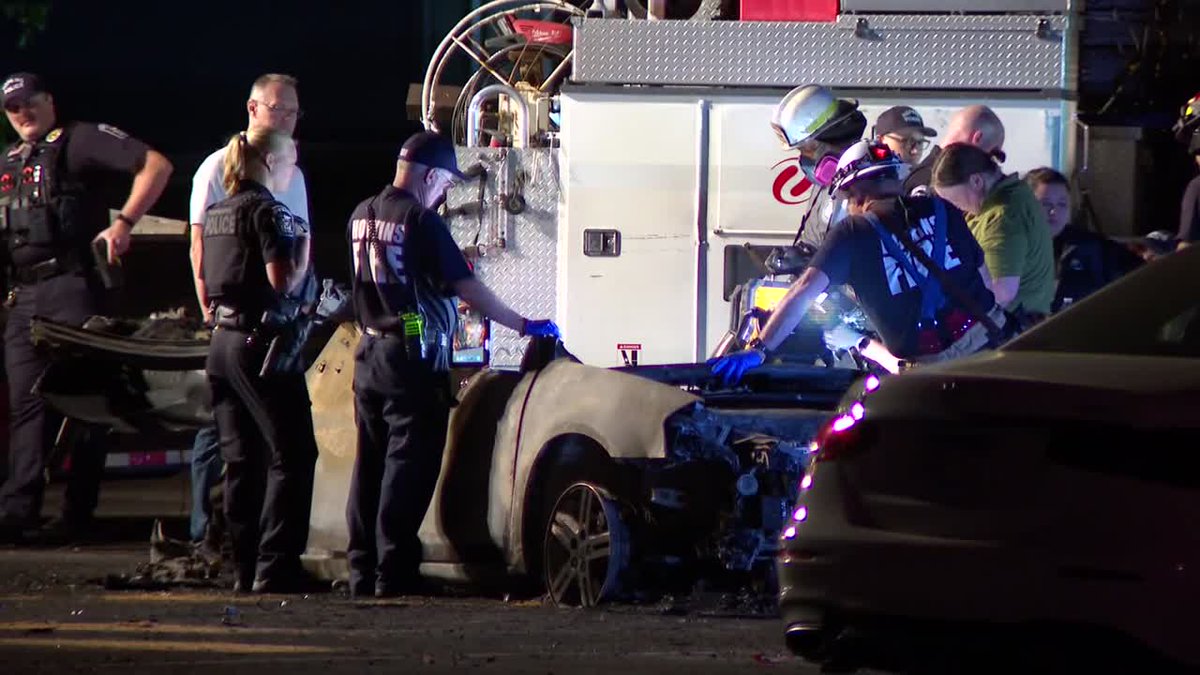 One person was killed after a utility pole fell on a car and sparked a fire
