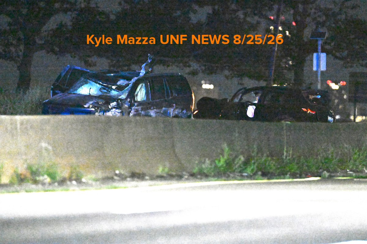 NYPD works the scene where two men were killed, two other men were critically injured and two women were injured in a vehicle crash on Belt Parkway and 65th Street at Exit 1 Eastbound within the confines of the 68 precinct in Brooklyn, New York